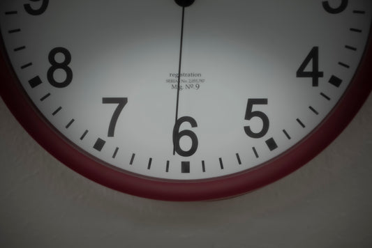 a close up of a clock face showing the time