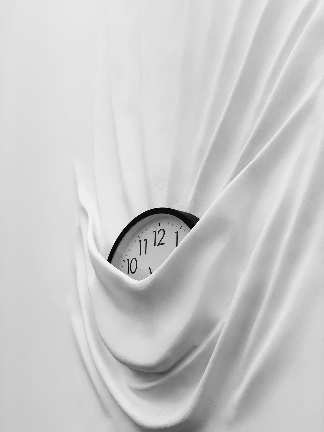 round white and black analog clock
