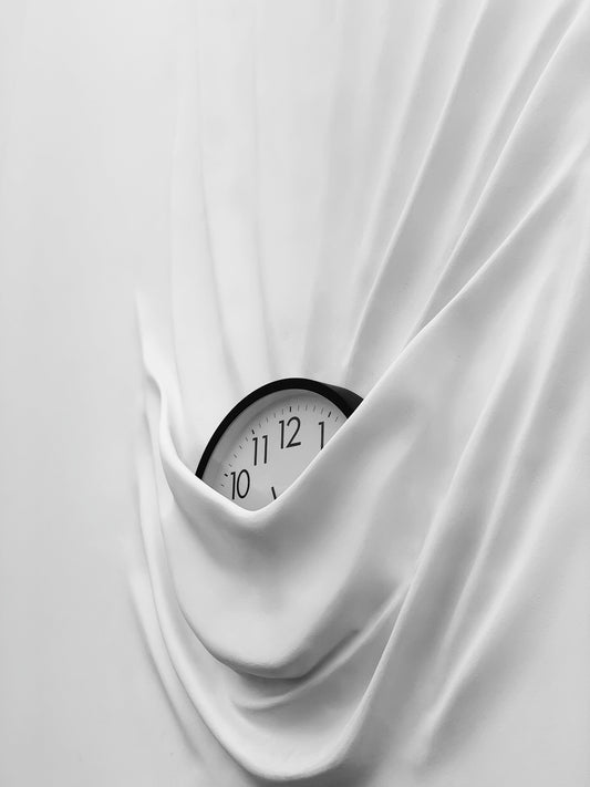 round white and black analog clock