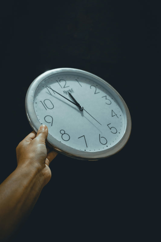 silver and white analog wall clock