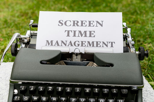 a close up of a typewriter with a sign on it
