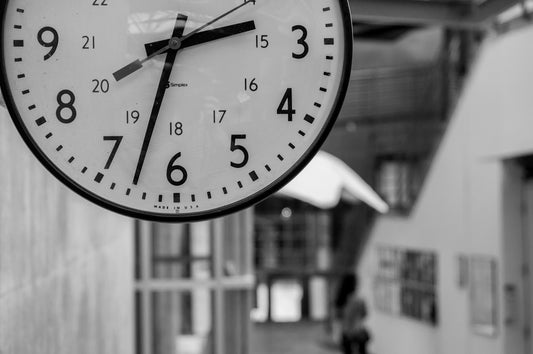 A close-up of a vintage wall clock
